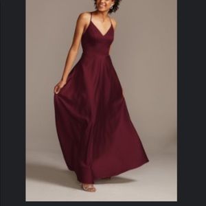 Brand new, never worn tags still intact. Satin a-line spaghetti strap dress.